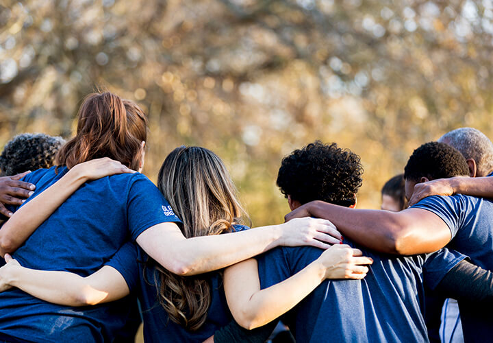 Group of people huddled together