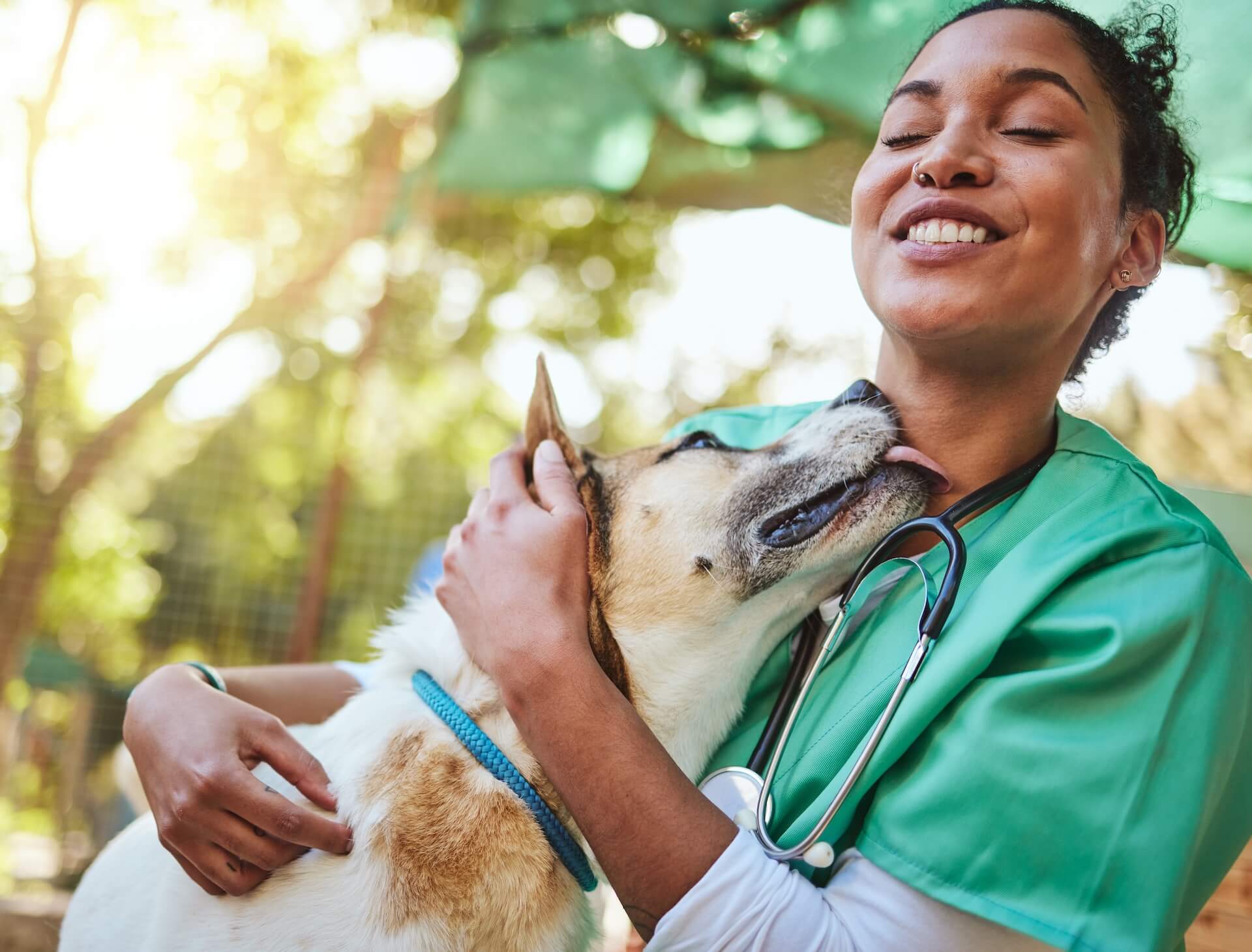 Woman hugging dog