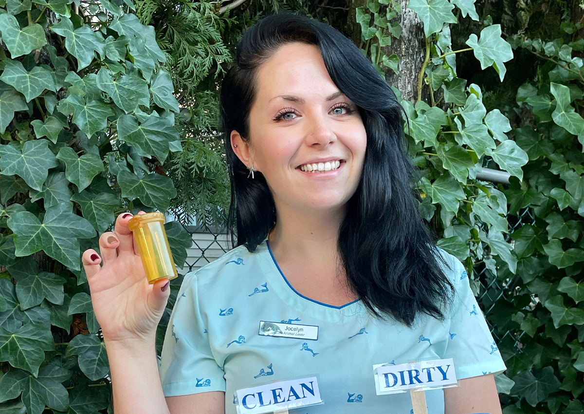 Person holding pill bottle
